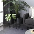 thumbnail image 3 of CosmoLiving by Cosmopolitan Black Metal Geometric Cutout Indoor Outdoor Planter with Removeable Ring Stands, Set of 3 23", 19", 15"H, 3 of 14