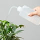 thumbnail image 4 of Una botella exprimible de 250 ml con una pipeta estrecha para plantas, una botella de agua para condimentos extruida, 4 of 5