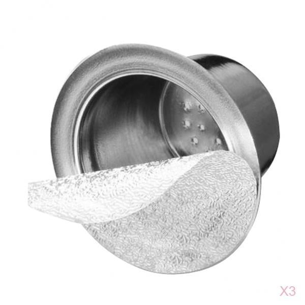 cápsulas de café reutilizables sunnimix de acero inoxidable 3 piezas cápsula plateada en primer plano, vista frontal e inclinada; cuerpo cilíndrico de acero inoxidable con borde acanalado, fondo con orificios y filtro perforado texturizado extraíble; tamaño M 37.6x22x24 mm; adecuada también como cápsula recargable para preparar muestras de café en casa.