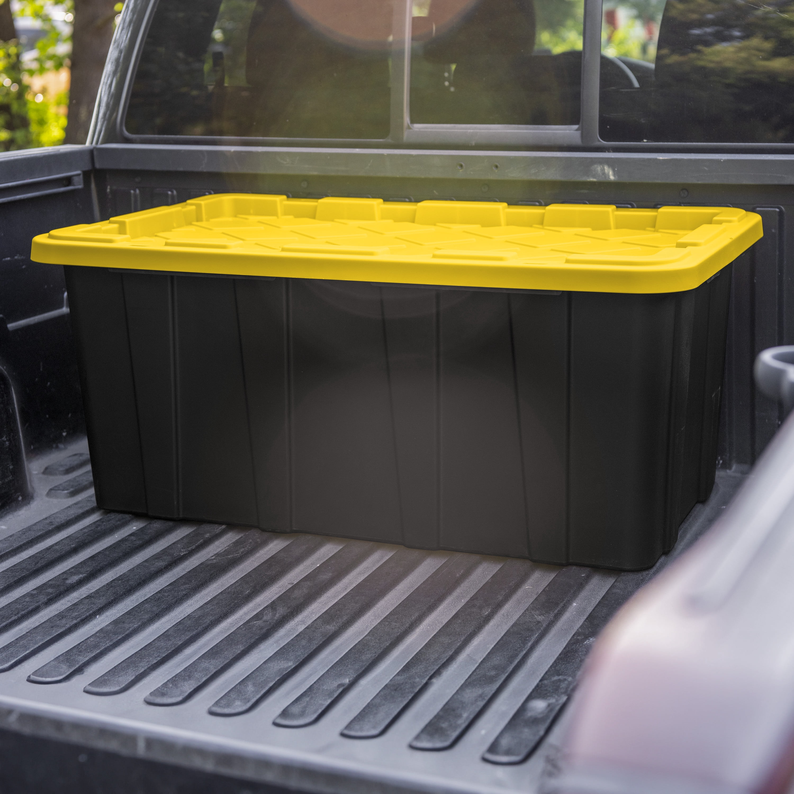 Sterilite 38 Gallon Industrial Tote, Rugged Plastic Storage Bin, Snap-on Lid, Yellow/Black, 4 pack