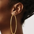 thumbnail image 3 of 14K Yellow Gold Polished 2X70mm Lightweight Tube Hoop Earrings (70 X 2) Made In Peru tf580, 3 of 5