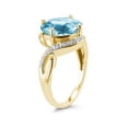 thumbnail image 2 of SZUL Women's Oval Shaped Blue Topaz and Diamond Curve Ring in 10K Yellow Gold, 2 of 3