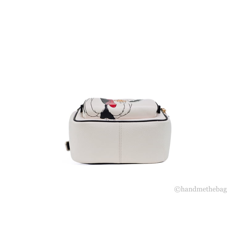coach cruella backpack Disney X Coach Mini Court With Motif Refined pebble leather Inside zip and multifunction pockets Double zip closure fabric lining Handle with 1 1/2 drop Outside zip and open pockets Adjustable shoulder straps 7 3/4 (L) x 8 3/4 (H) x 3 1/2 (W) Part of a special collaboration where Disneys most iconic villains meet iconic Coach design Disney x Coach Disney Style No. COACH Disney Cruella Motif Mini