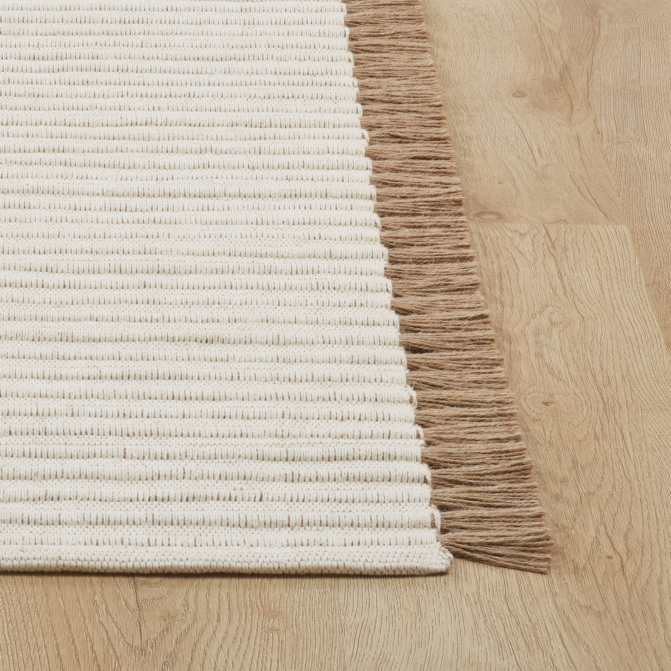 Beautiful Indoor Cotton Jute Accent Rug with Tassels by Drew Barrymore, 27 x 45 Inch Neutral