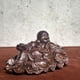 thumbnail image 3 of Ebony wood carved Maitreya Buddha with ingot shape, symbolizing harmony and wealth, a large-bellied Buddha, a desktop ornament, a car decoration, a wooden handicraft., 3 of 3