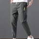 thumbnail image 4 of Pantalones casuales de moda para hombre, con bolsillos y tobillos, color liso, cintura elástica y cordón ajustable., 4 of 6