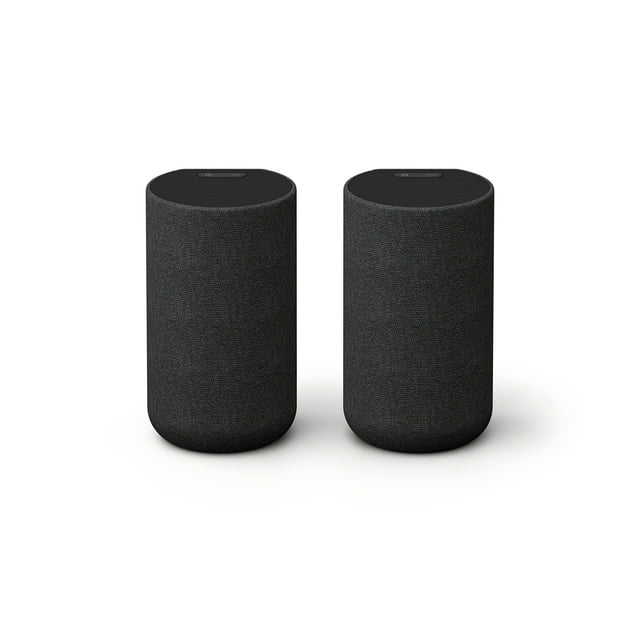 altavoces traseros inalámbricos sony sa-rs5 con batería integrada para bravia theatre (bar 8, bar 9), ht-a7000/a5000/a3000 y str-an1000 — par frontal de altavoces cilíndricos negros, vista centrada; carcasa con tela texturizada y superficie superior plana con controles visibles, diseño compacto sin cables; compatible con mapeo de sonido espacial 360 para audio envolvente desde parlantes elevados; batería integrada hasta 10 horas con carga rápida; a menudo usados como altavoces traseros portátiles para cine en casa móvil.