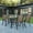 Brown, variant on BizChair 5 Piece Modern Patio Set 55 Tempered Glass Table and Brown Flex Comfort Chairs