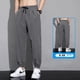 thumbnail image 1 of Pantalones de seda de hielo de talla grande para hombre, moda ins de verano, pantalones cortos informales deportivos holgados que combinan con todo, atados al tobillo, 1 of 6