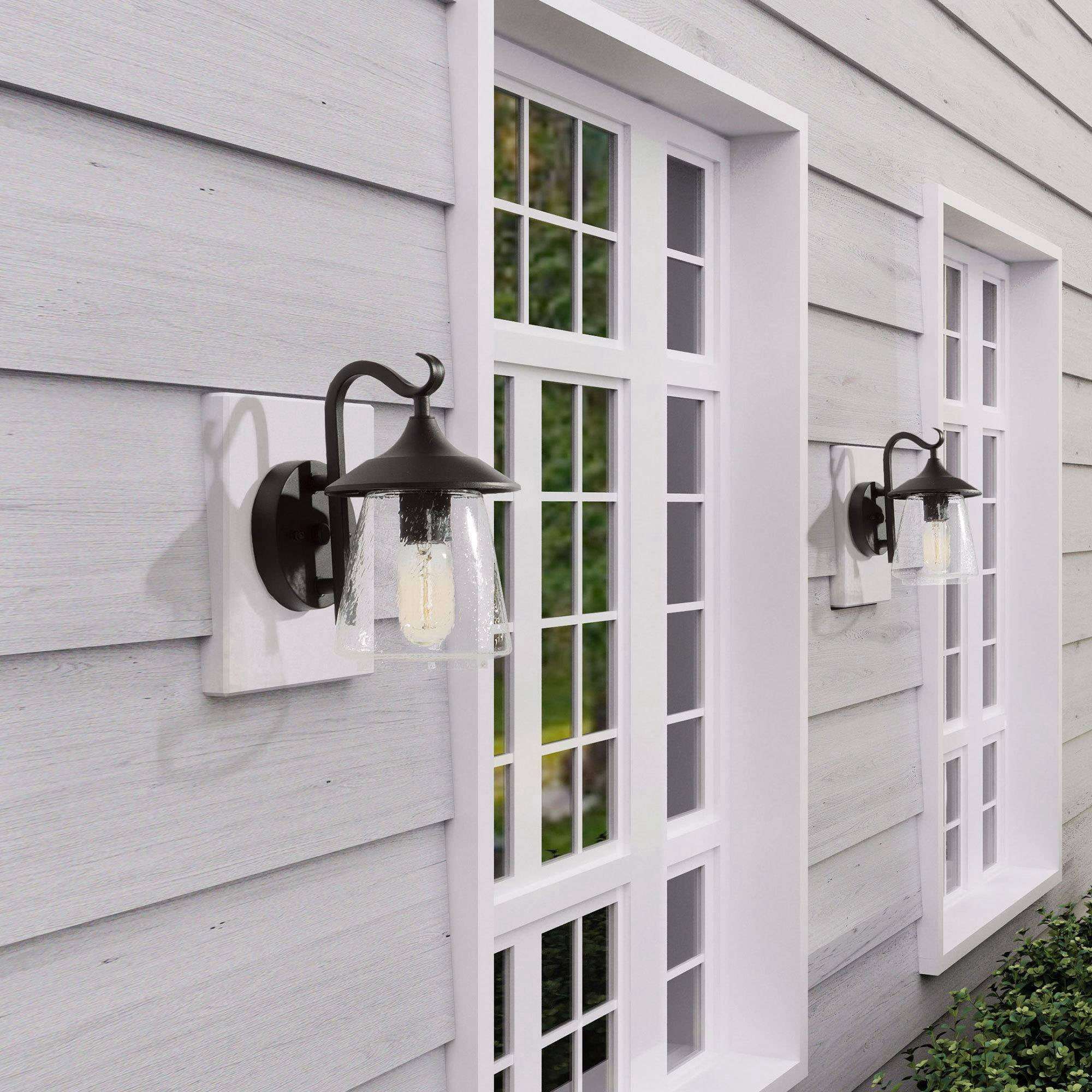 LNC Outdoor Wall Sconce with Curved Arm and Seeded Glass Shade, Matte Black, 10" Fixture