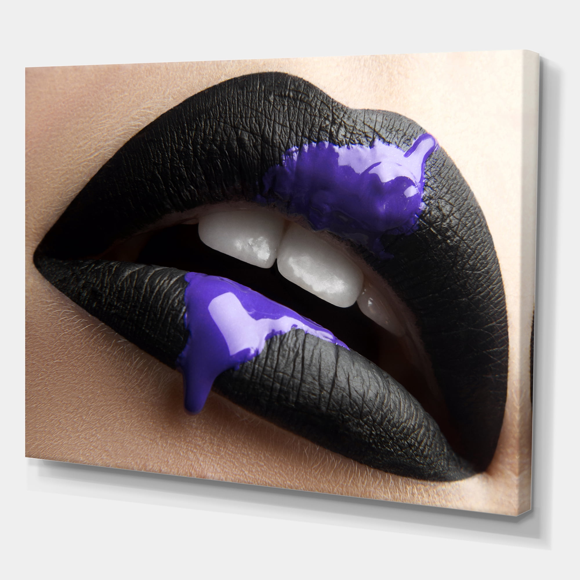 Woman Lips With Black Lipstick & Purple Paint 12 in x 8 in Photography Canvas Art Print, by Designart