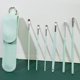 thumbnail image 3 of Cuchara limpiadora de orejas de acero inoxidable, Kit de herramientas de eliminación de cera de oreja para bebés y adultos, 6 piezas, 3 of 4