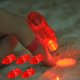 thumbnail image 1 of Paquete de 5 luces de dedo | Juguetes novedosos luminosos LED para niños y adultos | 4 Colores - Bandas elásticas - Botón de cambio | Recuerdos de fiesta para cumpleaños, Navidad, Halloween |, 1 of 5
