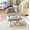 Grey, variant on Rolling Low Stool with Backrest – Padded Seat & Silent Casters