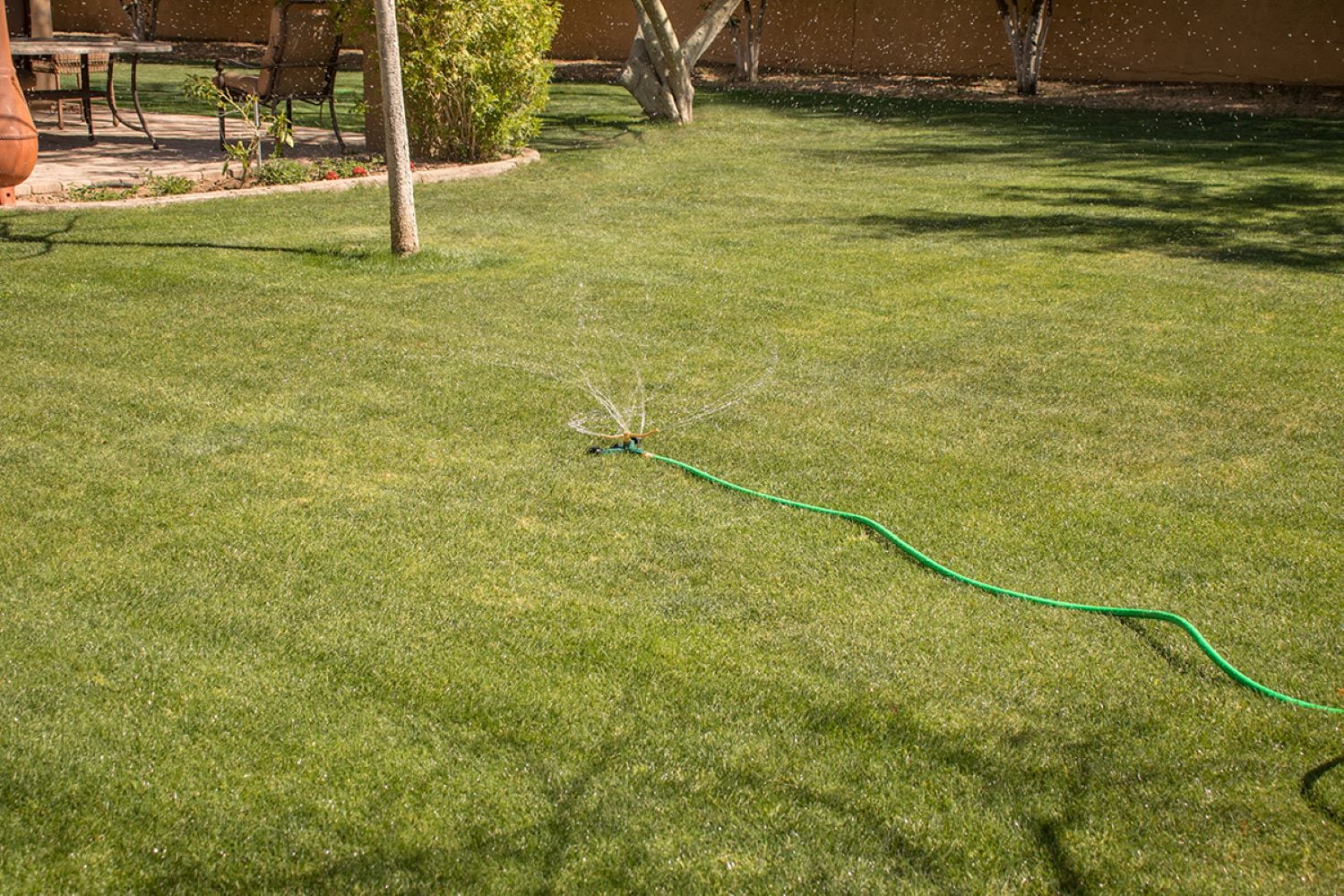 Orbit Brass, 3-Arm, Adjustable Lawn Watering Sprinkler with Wheeled Base