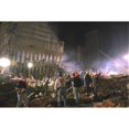 thumbnail image 2 of On The South West Area Of Ground Zero A Bucket Line Removes Debris At Night History (36 x 24), 2 of 2