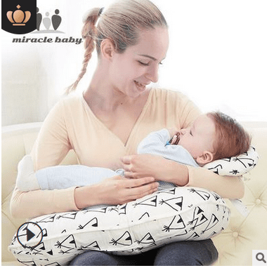 mother feeding pillow