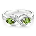 thumbnail image 2 of Gem Stone King 925 Sterling Silver Green Peridot and White Created Sapphire Infinity Love Knot Ring for Women | 1.11 Cttw | Oval 6X4MM | Gemstone Birthstone | Jewelry Gifts for Mom Wife Her | Size 6, 2 of 5