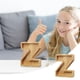 thumbnail image 1 of Lata de ahorro de madera con letras en inglés y cristal transparente., 1 of 6