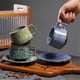 thumbnail image 4 of Juego de taza de café/té con platillo de cerámica vintage de gres, 4 of 7