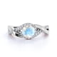 thumbnail image 4 of JeenMata Anillo de Compromiso con Diseño Único de Infinito de Piedra Lunar y Moissanita de Corte Redondo de 1,5 Quilates en Oro Blanco de 18 K sobre Plata, 4 of 6