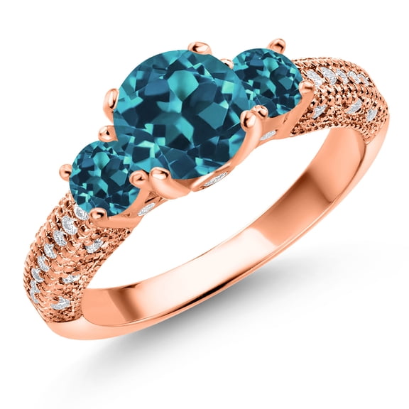 Gem Stone King 18K Rose Gold Plated Silver London Blue Topaz and White Moissanite Engagement Ring for Women (2.44 Cttw, Gemstone November Birthstone, Round 7MM and 4MM, Size 8)