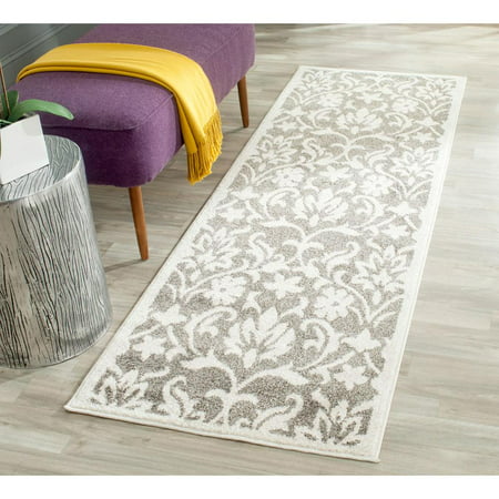 Safavieh AMHERST  DARK GREY / BEIGE  2 -3  X 11   Area Rug  AMT424R-211 AMHERST  DARK GREY / BEIGE  2 -3  X 11   Area Rug  AMT424R-211 Coordinate indoor and outdoor living spaces with fashion-right Amherst all-weather rugs by Safavieh. Power loomed of long-wearing polypropylene  beautiful cut pile Amherst rugs stand up to tough outdoor conditions with the aesthetics of indoor rugs. - Backing: No Backing - Color: DARK GREY / BEIGE - Shape: Runner - Size: 2 -3  X 11  - Weight: 10 - Construction: Power Loomed - Pile Height: 0.39 - Fiber/Finish: 67% Polypropylene 18% Fibrillated Polypropylene 8% Latex 7% Poly-cotton(warp)