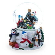 Penguins' Festive Tree Celebration Snow Water Globe