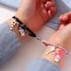 thumbnail image 2 of Pulsera de cuerda elástica para parejas, brazalete con dijes magnéticos, colgante de amistad, accesorios de joyería de moda, día de san valentín, 2 uds., 2 of 4