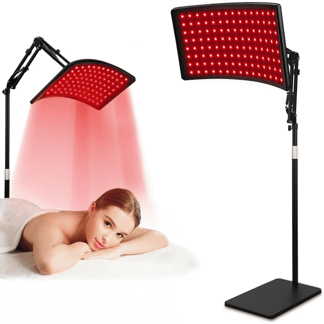 Floor-Standing Red Light Panel, a large infrared device for full body wellness support. The panel emits red and near-infrared light, mounted on a fully adjustable floor stand with smooth-rolling wheels for hands-free use. It features dual-wavelength technology with 660nm red light for skin vitality and 850nm near-infrared light for deeper muscle and joint relief. A person is lying under the panel, showcasing its use for red light therapy sessions.