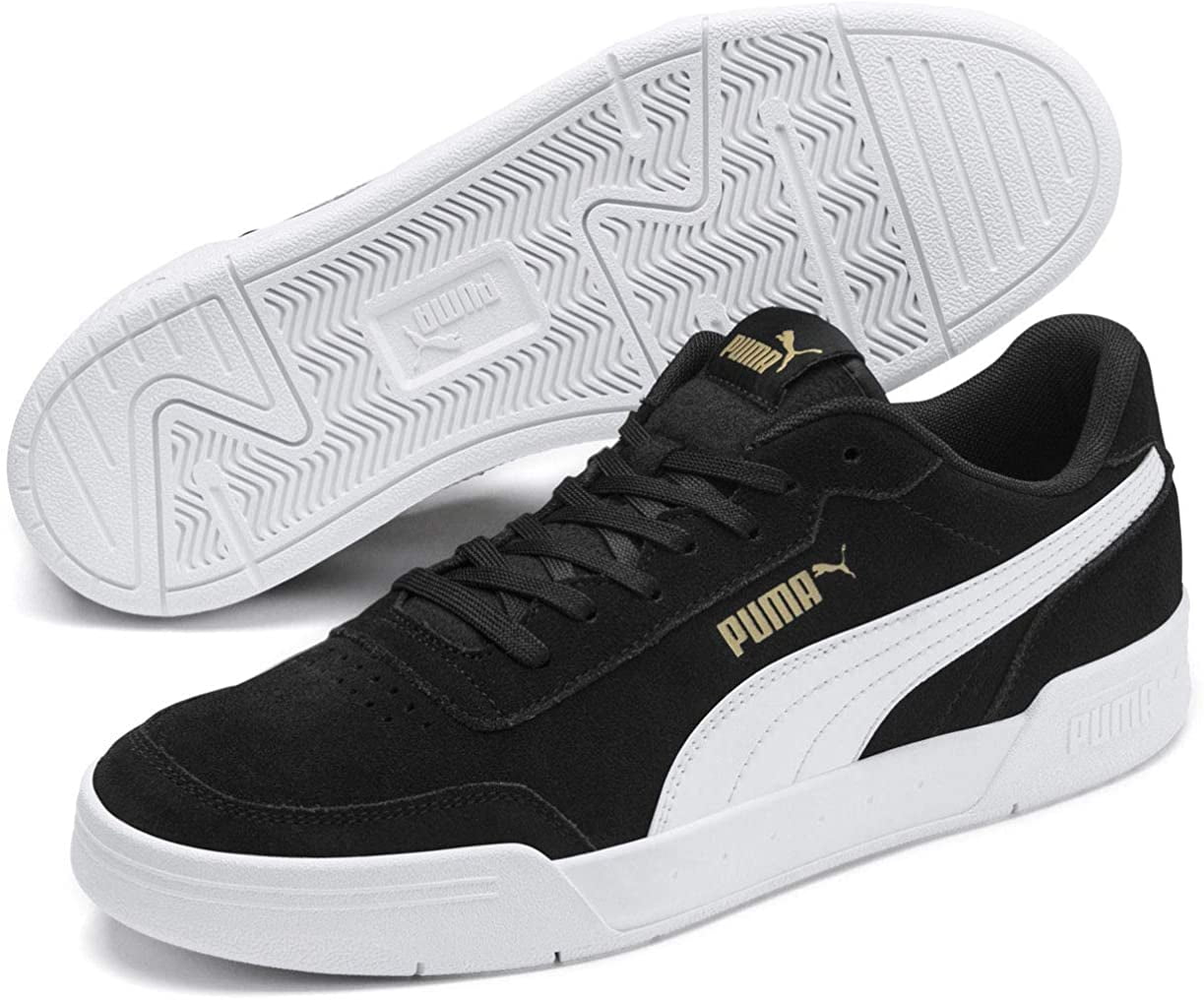 black white and gold pumas