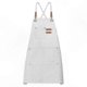 thumbnail image 1 of White Canvas Apron with Adjustable Straps, Cross-Back Design, and Three Pockets for Cooking and Baking, 1 of 5