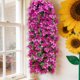 thumbnail image 1 of Guirnalda de pared colgante de flores violetas artificiales para bodas, decoración del hogar y eventos, ramos reutilizables de seda de orquídeas y glicinas, 1 of 6