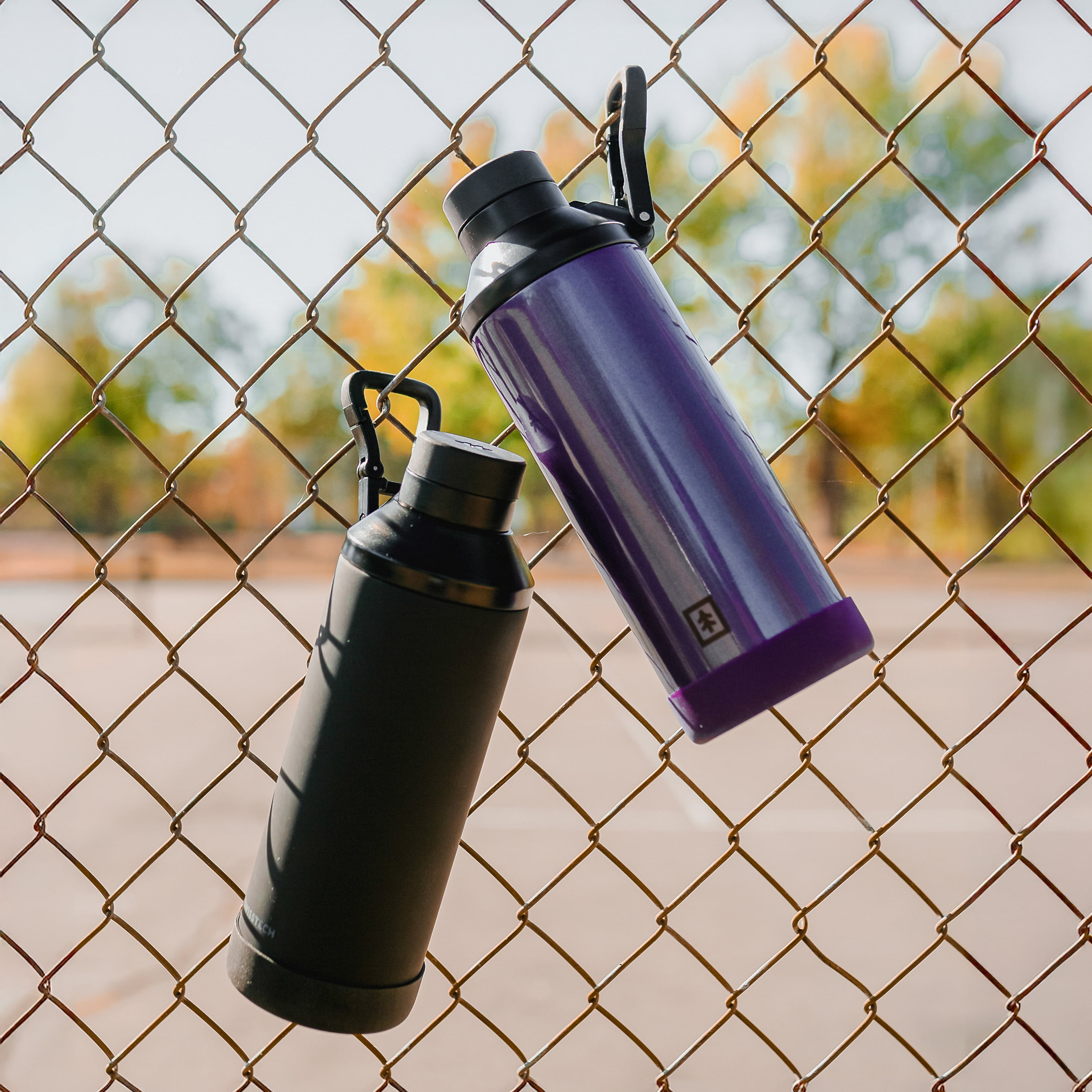 Swiss Tech 24 oz Triple-Walled Stainless Steel Water Bottle, Black, Leakproof Chug Lid with Clip Handle and Silicone Boot