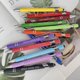 thumbnail image 1 of Juego de 12 bolígrafos multifuncionales Loves You, bolígrafo para escribir textos publicitarios, bolígrafo para pantalla de 30 ml, decoraciones navideñas para el hogar, ofertas del día, liquidación, 1 of 1