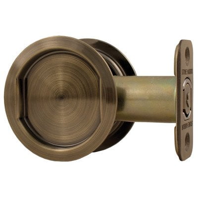 Round Pocket Door Lock, Passage (Hall/Closet) Latch, 2-3/8" Backset, RCL, Antique Brass by Stone Harbor Hardware