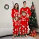 thumbnail image 1 of Elegante conjunto familiar a juego con estampado de astas de muñeco de nieve navideño en rojo, 1 of 5