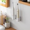 thumbnail image 2 of Moyic Soporte para cepillos de eléctrico, estante para cepillos de montado en la pared del baño, organizador de soporte sin costuras sin Juegos de accesorios de baño, 2 of 6