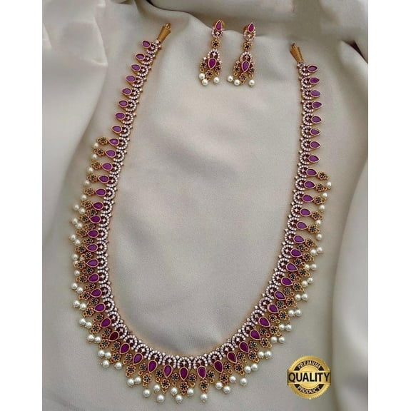 South Indian Bollywood Gold Plated AD CZ Multicolor Stone Flower Haaram Matte Finish Brass Pearl Necklace Set with Matching Drop Earrings – Traditional Bridal Jewelry