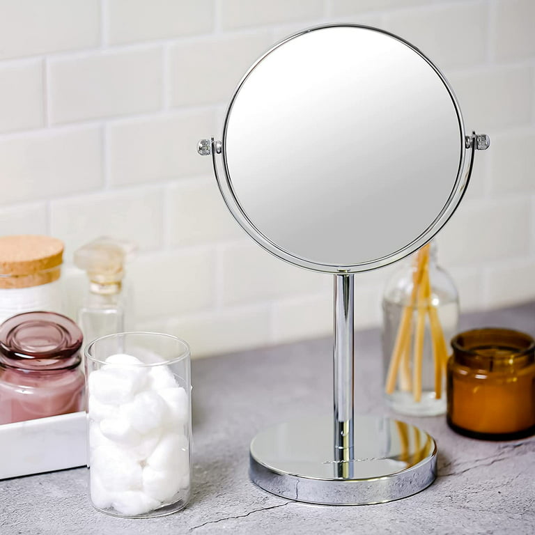 small round makeup mirror on a stand with built in lighting