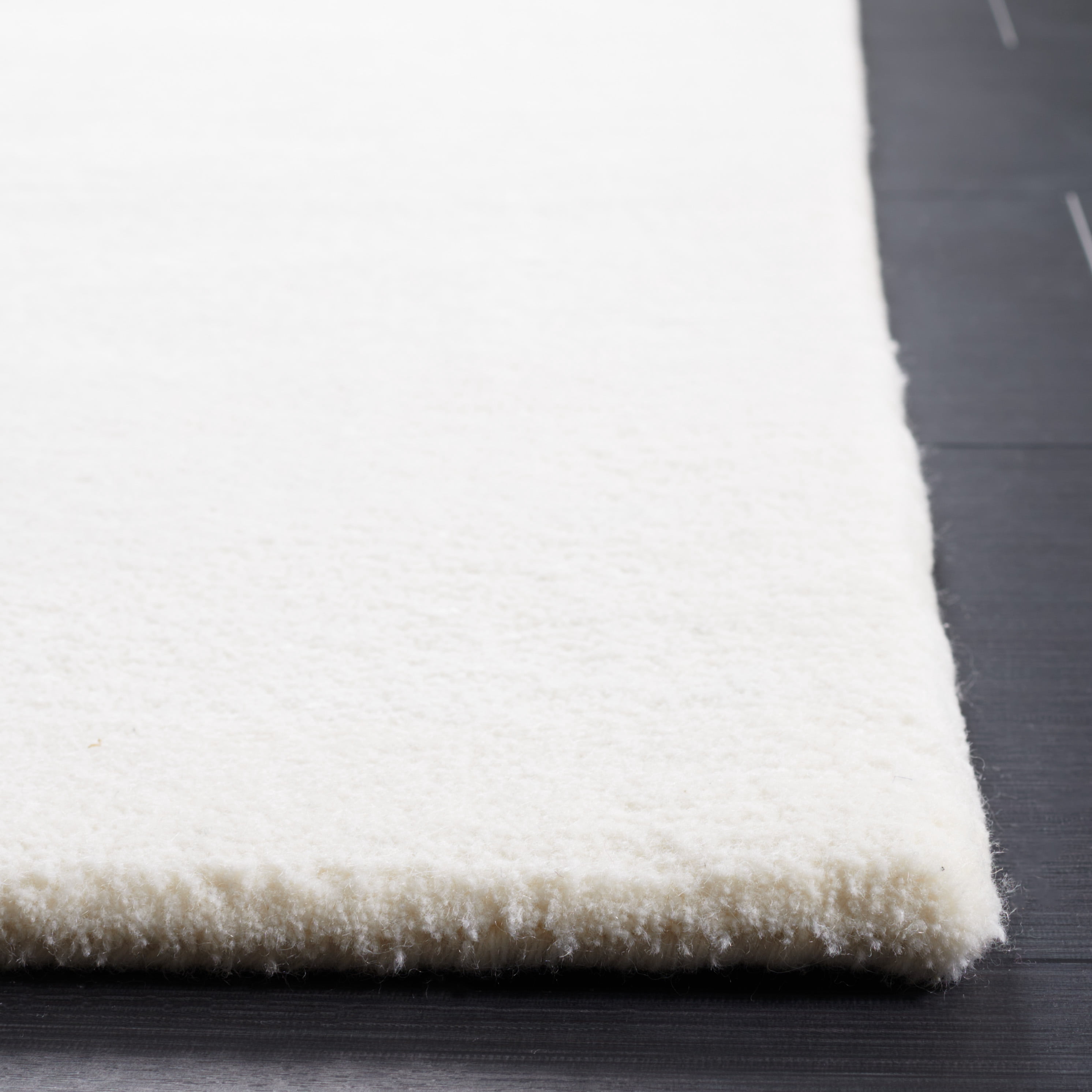 SAFAVIEH Fifth Avenue Debra Solid Area Rug, Ivory, 3' x 5'