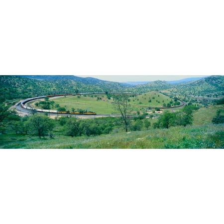 The Tehachapi Train Loop near Tehachapi California is the historic location of the Southern Pacific Railroad where freight trains gain 77 feet in elevation and show freight cars traveling in giant (Best Wedding Locations In California)