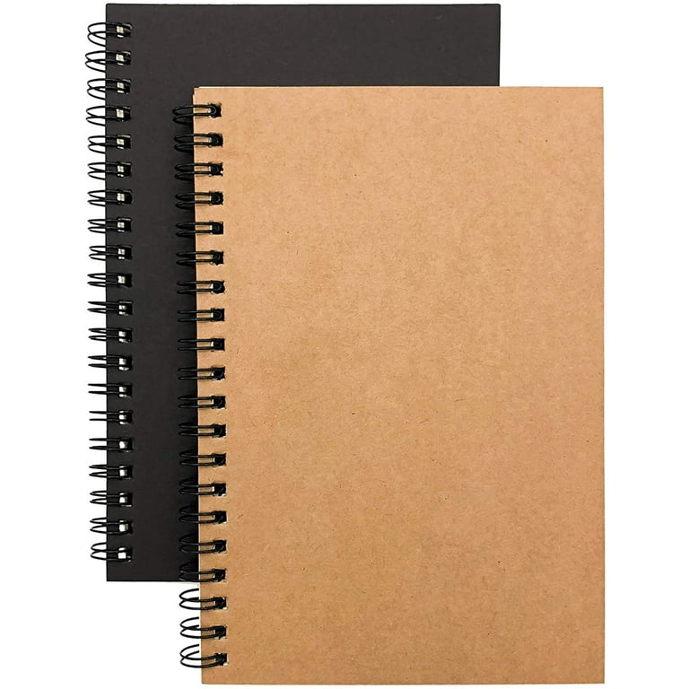 Blank white spiral notebook containing book, notebook, and white