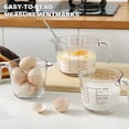 thumbnail image 2 of 3-Piece Heat-Resistant Glass Measuring Cup Set Made of thickened lead-free glass Includes 10.14 oz + 16.91 oz + 33.81 oz measuring cups with handles Features four-level precision graduations Ergonomi, 2 of 11