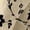 Beige Black Floral, variant on Nyfairy Plus Size Women's Floral Embossed Print Long Sleeve Button Down Casual Shirt
