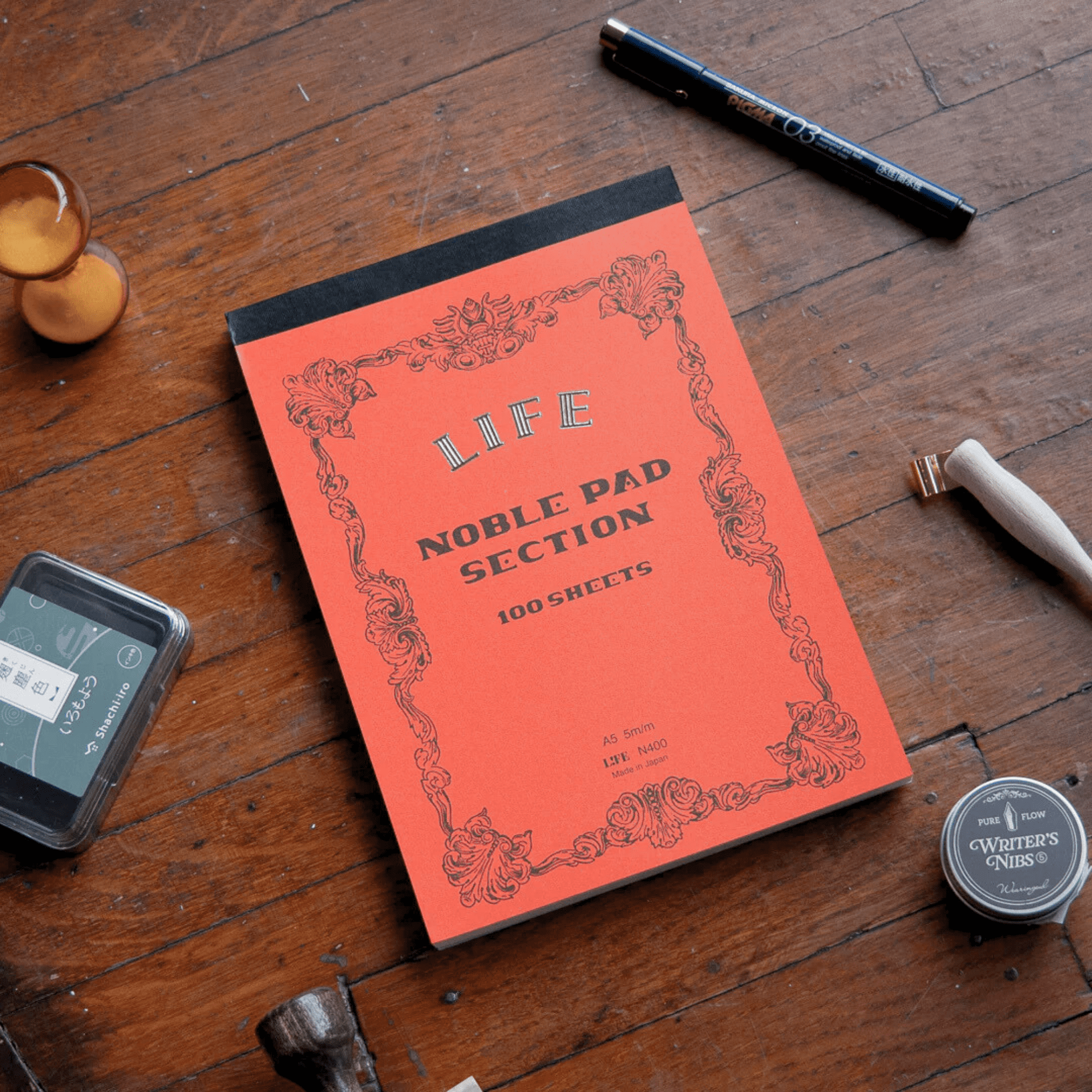 Life Noble Section Notepad [Bound On Top]: 8 in. x 12 in. (Orange Cover, Gridded Pages)
