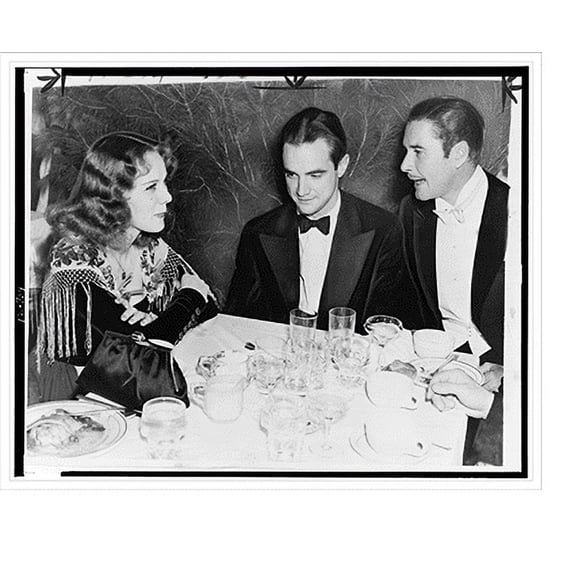 Historic Print, [Howard Hughes (center) with Helen Gilbert and Errol Flynn seated at table for charity Christmas party, Beverly Hills, California], 16" x 20"