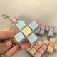 thumbnail image 3 of Llavero con botón y tecla - Diseño de teclado DIY, colores macarrón, suave sonido de clic, antiestrés, regalo de bolsillo para todas las edades, 3 of 5