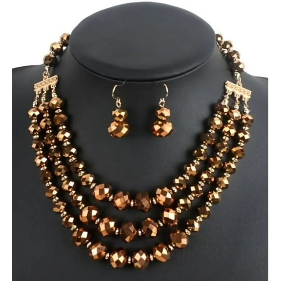 Pierced gold and brown shiny three strand necklace and earrings set