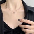 thumbnail image 1 of Delicate Elegance: Bow-Shaped Pendant on a Thin Chain, 1 of 9